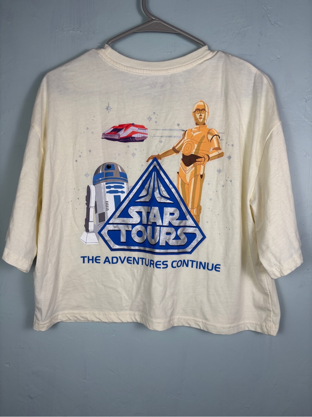Star Wars Disney Cream Boxy, Crop T-shirt with Blue and Gold Star Tours Graphic